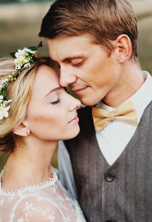A large portrait of the bride and groom. Rustic styleの写真素材