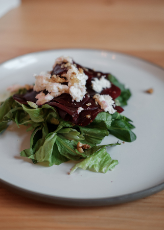 beet salad, cheese, brynza, on a light background, close-upの写真素材
