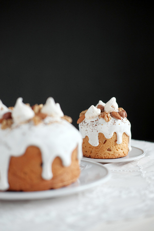 Easter cake with white icing on a plate