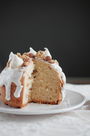 Easter cake with white icing on a plate