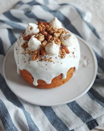 Easter cake with white icing on a plate