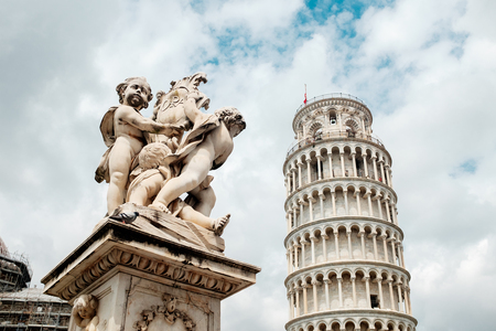 Travel in Italy. Architecture of Pisa. Leaning Tower of Pisa on a sky background. Italyの写真素材