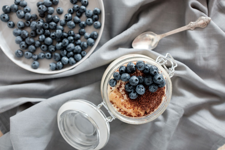 A healthy dessert with blueberries. Dessert at the bankの写真素材