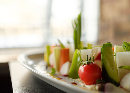 Vegetable plate. Beautiful serving of food in the restaurantの写真素材