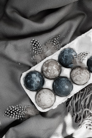 gray easter eggs on gray fabric