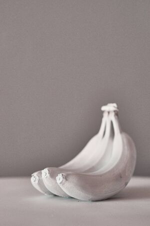 Bananas on a grey background. Minimal style. Minimal style. gmo concept. GMO.top viewの写真素材
