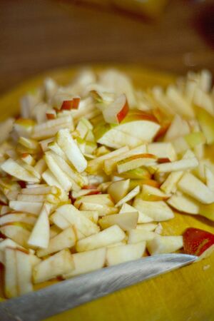 Close-up of chopped fresh apples. concept of raw food diet, vegetarianism, home baking conceptの写真素材