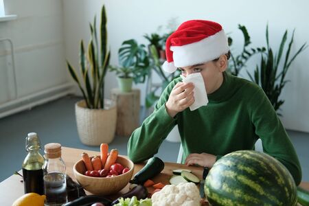 Caucasian woman has runny and common cold. Sick woman with seasonal infections, flu, allergy