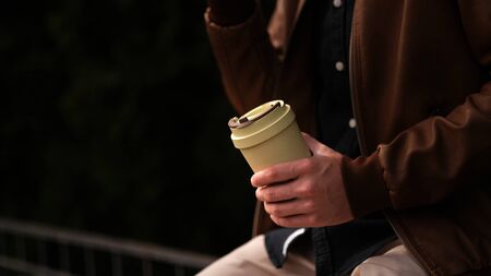 Zero waste concept. Use eco coffee cup. Zero waste, green and conscious lifestyle concept. Reusable on the go drink container ideasの写真素材