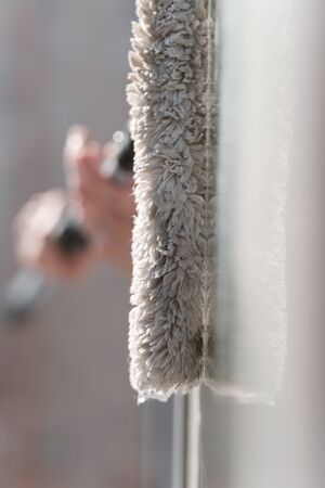 spring-cleaning. Wash the windows manually. Top viewの写真素材