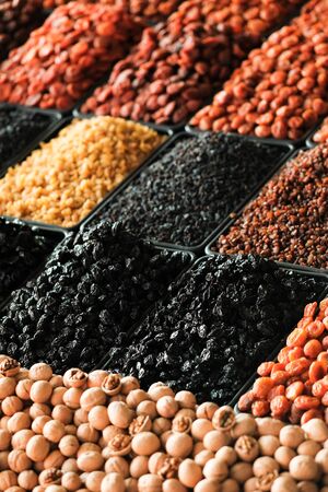 dried fruits and nuts close-up. Dried fruits and nuts on the market. side view