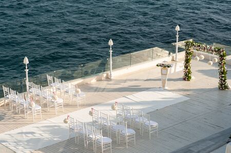 Wedding day. beautiful Wedding setting with sunny day. Beautiful wedding flower decorations. Wedding...