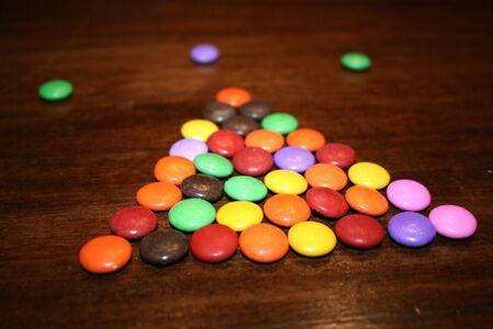 A small design of smarties on a tableの写真素材