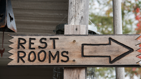 wooden restroom signの写真素材