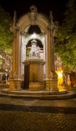 Illuminated statue in a park in Lisbonの写真素材