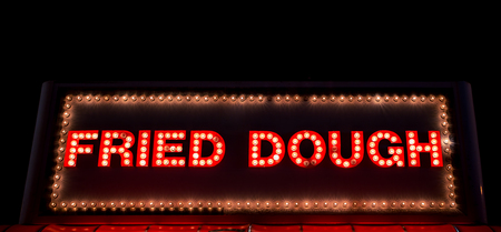 neon fried dough signの写真素材
