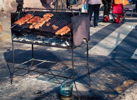 meat cooking on a grillの写真素材