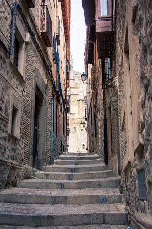 narrow street and steps Toledoの写真素材
