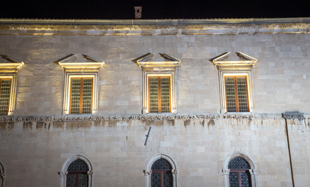 glow of windows at night in Dubrovnikの写真素材