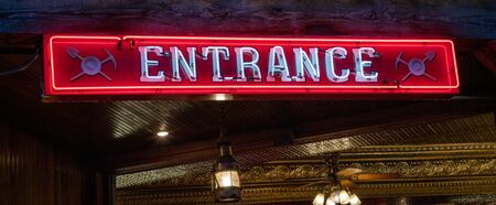 red neon entrance at nightの写真素材