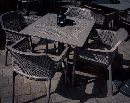 empty table and chairs at a cafe