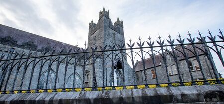 iron fence in front of a Churchの写真素材