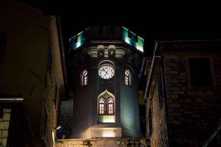 clocktower in Herceg Novi at nightの写真素材