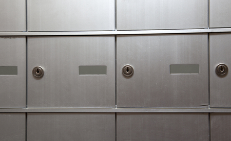 silver metal bank vaults or post office boxes in a building