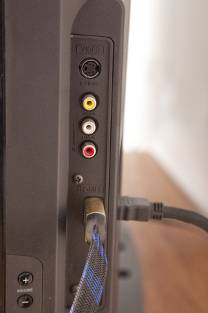 hdmi, audio, video and volume on the side of a big televisionの写真素材