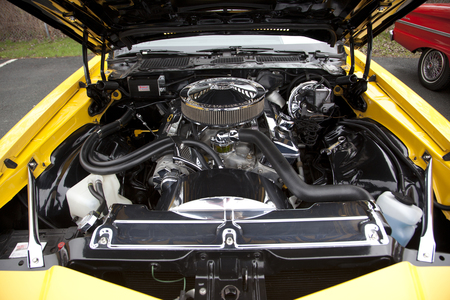 May 11, 2019- Eastern Passage, Nova Scotia- under the bonnet of a beautiful antique yellow 1977...