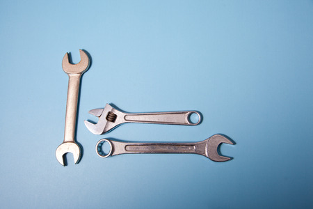 A variety of metal wrenches viewed along the handle portion, ready for workの写真素材
