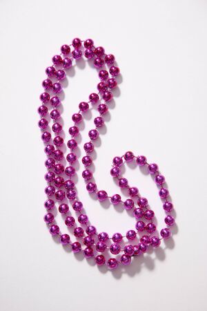 vertical layout of pink bead necklaceの写真素材
