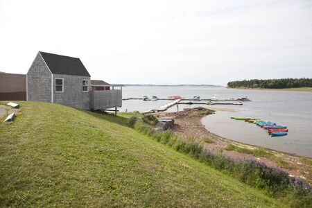 Breadalbane, PEI- July 27, 2019: Wharf with kayaks and small boat rentals in Prince Edward Islandのeditorial素材