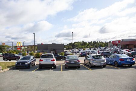 September 8, 2019 - Clayton Park, Halifax, Nova Scotia - piles of cars and people trying to get to MacDonalds and Tim Hortons the morning after Hurricane Dorianのeditorial素材