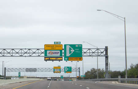 February 21, 2020- Orlando, Florida: on highway 414 in Florida, the signs for the e-pass toll and...
