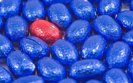 collection of blue easter eggs with one red eggの写真素材