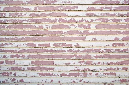 old weatherboard wooden wall all the paint peelingの写真素材