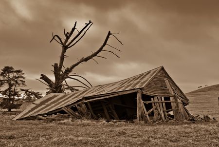 old building on his farm is falling downの写真素材