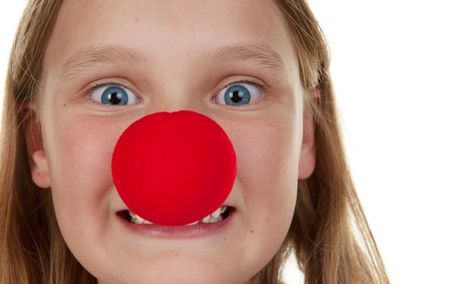 young girl with a red noseの写真素材