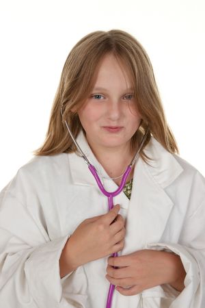 young girl pretending to be a doctor isolated on whiteの写真素材