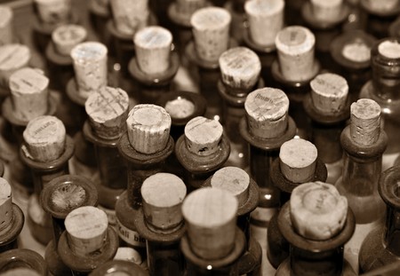 rows of old medicine bottle with cork stoppers の写真素材