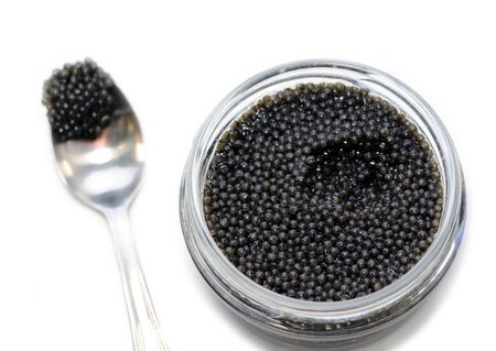 Black sturgeon caviar on a white background.の写真素材