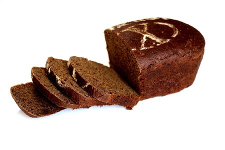 Slices of fresh black Borodino bread on a white background.の写真素材