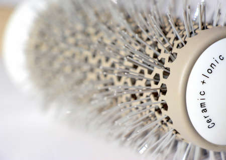 Brushing comb for styling and straightening hair. Professional tool for a hairdresser stylist.の写真素材