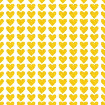 Seamless pattern of yellow hearts with polka dots. Fashionable print for textiles, bed linen, wrapping paper, holiday cards, notebooks.の写真素材