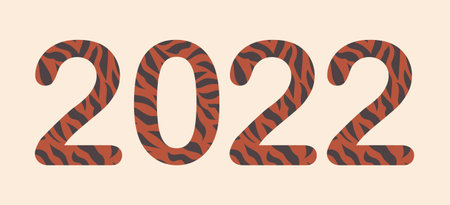 Year of the Tiger 2022. Numbers in the coloring of a wild animal on a pastel pink background.の写真素材