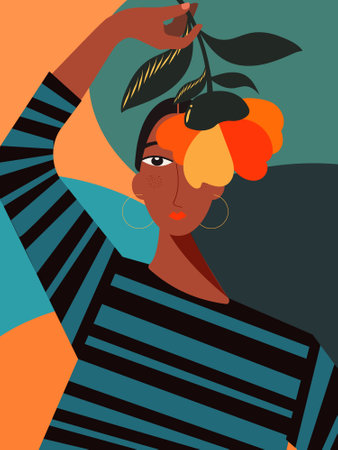 Beautiful woman in striped blouse posing holding flower in her hand covering half of her face.の写真素材