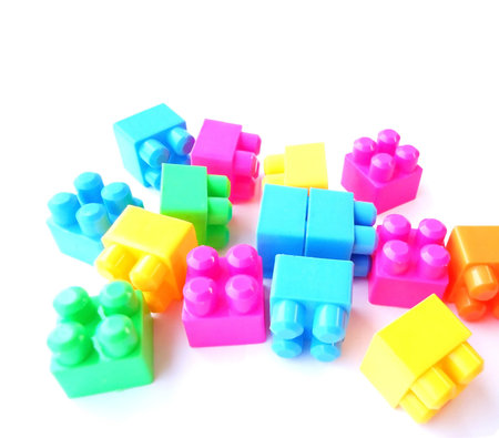 colorful plastic toys isolated on white background                               