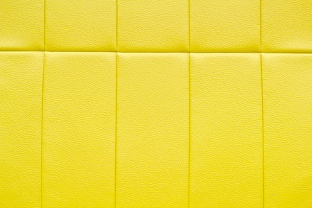 Bright luxury yellow leather backgroundの写真素材