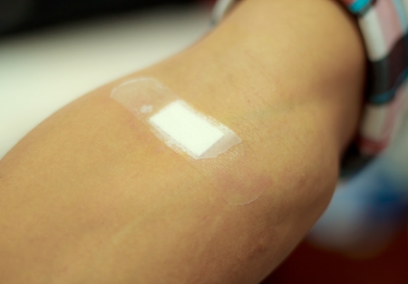 Sticking plaster adhesive plaster on the forearm.の写真素材